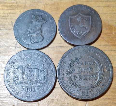 A group of four copper tokens comprising an 1811 worcester city and county 1 penny, 1811 newark 1