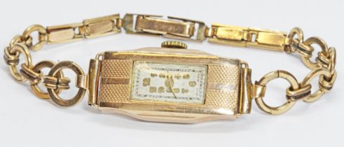 A ladies 9ct gold Art Deco style wristwatch, rolled gold strap.