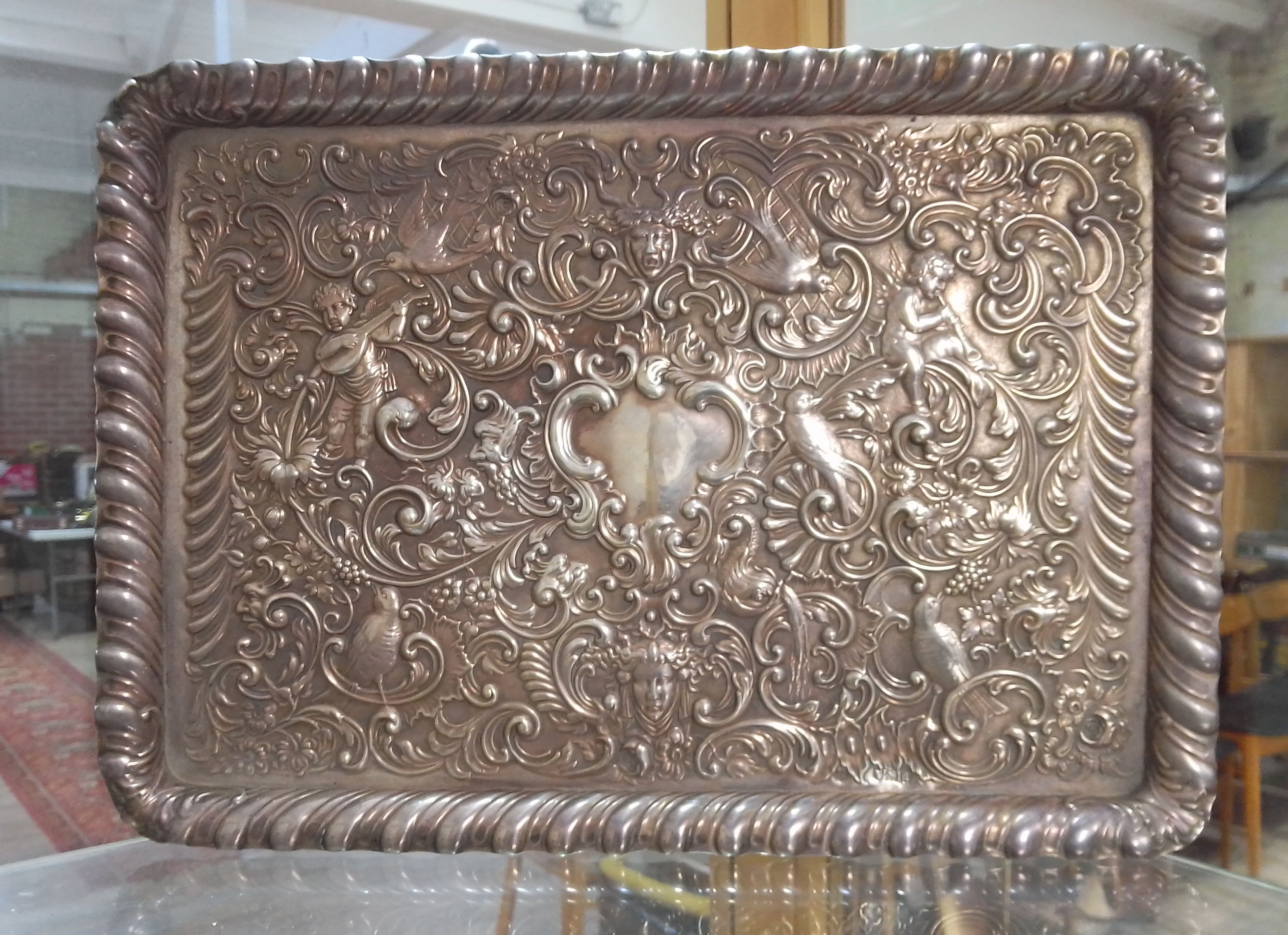 A late Victorian embossed silver tray, William Comyns & Sons, London 1899, 35.5cm x 25.5cm, weight