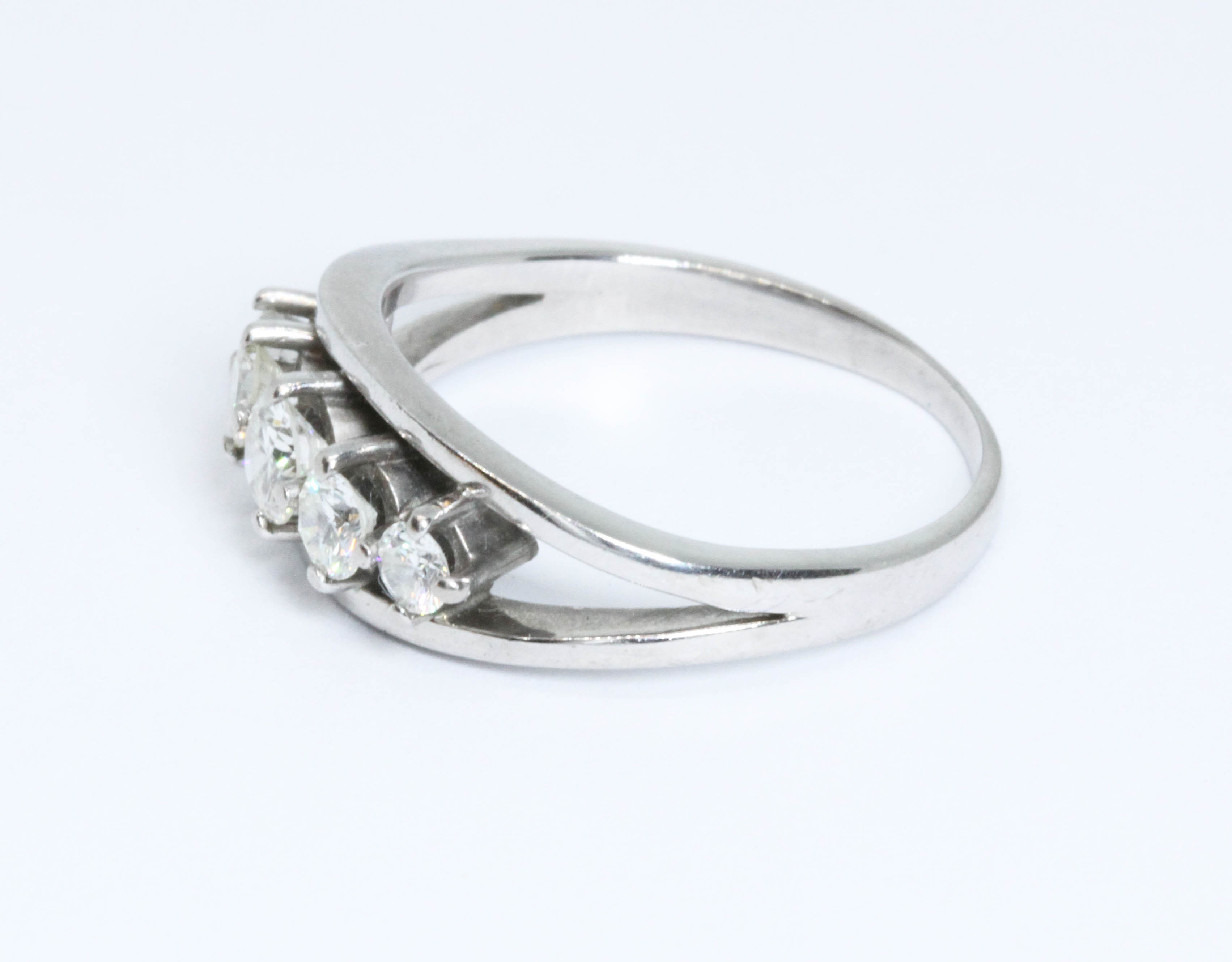 A five stone diamond ring, the round brilliant cut stones weighing approximately 0.07, 0.13, 0.22, - Image 3 of 3