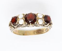 A hallmarked 9ct gold red and colourless stone ring, gross weight 3.1g, size M.