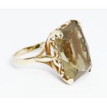 A 9ct gold citrine ring, the rectangular stone measuring approximately 20mm x 14.80mm, depth 8.27mm,