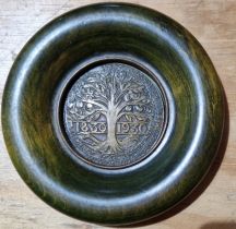 A Flemish bronze medallion mounted in wooden frame.