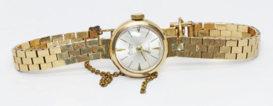 A hallmarked 9ct gold Bentima Star wristwatch with 9ct gold strap, gross weight 17.4g.