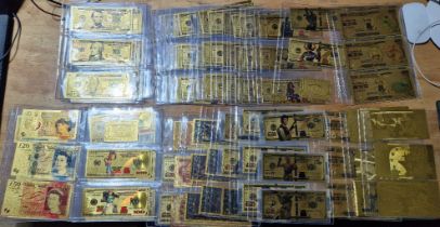 A large collection of gold banknotes/Commemoratives, some marked 24K gold to include GBP, USA,