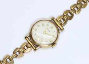 A hallmarked 9ct gold Rotary wristwatch with gold plated strap.