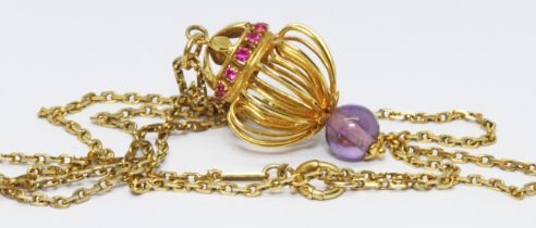 A amethyst and pink stone pendant necklace modelled as a lantern, marked '14K', length 25mm, on 46cm