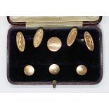 A leather cased hallmarked 9ct gold cufflink and button set, weight 6.7g. Condition - cufflinks