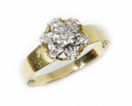 A hallmarked 18ct gold diamond cluster ring, gross weight 2.5g, size N. Condition - reverse of