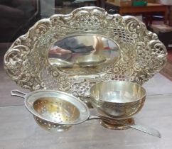 Hallmarked silver comprising a pin dish and a tea strainer with bowl, weight 5.2ozt.