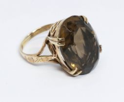 A dark brownish yellow citrine ring, maker's mark 'W&G' only, gross weight 4.7g, size F.