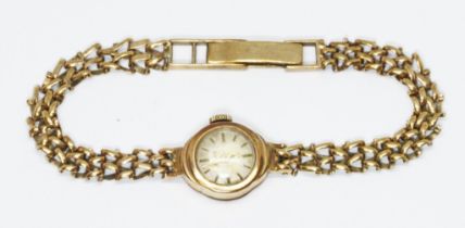 A ladies 9ct gold Accurist wristwatch with integrated strap, gross weight 12.5g.