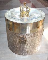 An Elizabeth II Silver Wedding commemorative silver tea caddy, gilt crown finial, textured body with