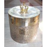 An Elizabeth II Silver Wedding commemorative silver tea caddy, gilt crown finial, textured body with