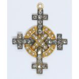 A 19th century Celtic cross style pendant set with rose cut diamonds and split pearls, yellow and