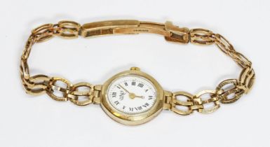 A ladies 9ct gold wristwatch with 9ct gold strap, gross weight 10g.