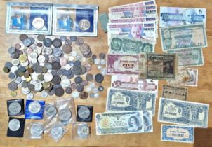 A cash tin of assorted GB & world coins & banknotes to include some silver