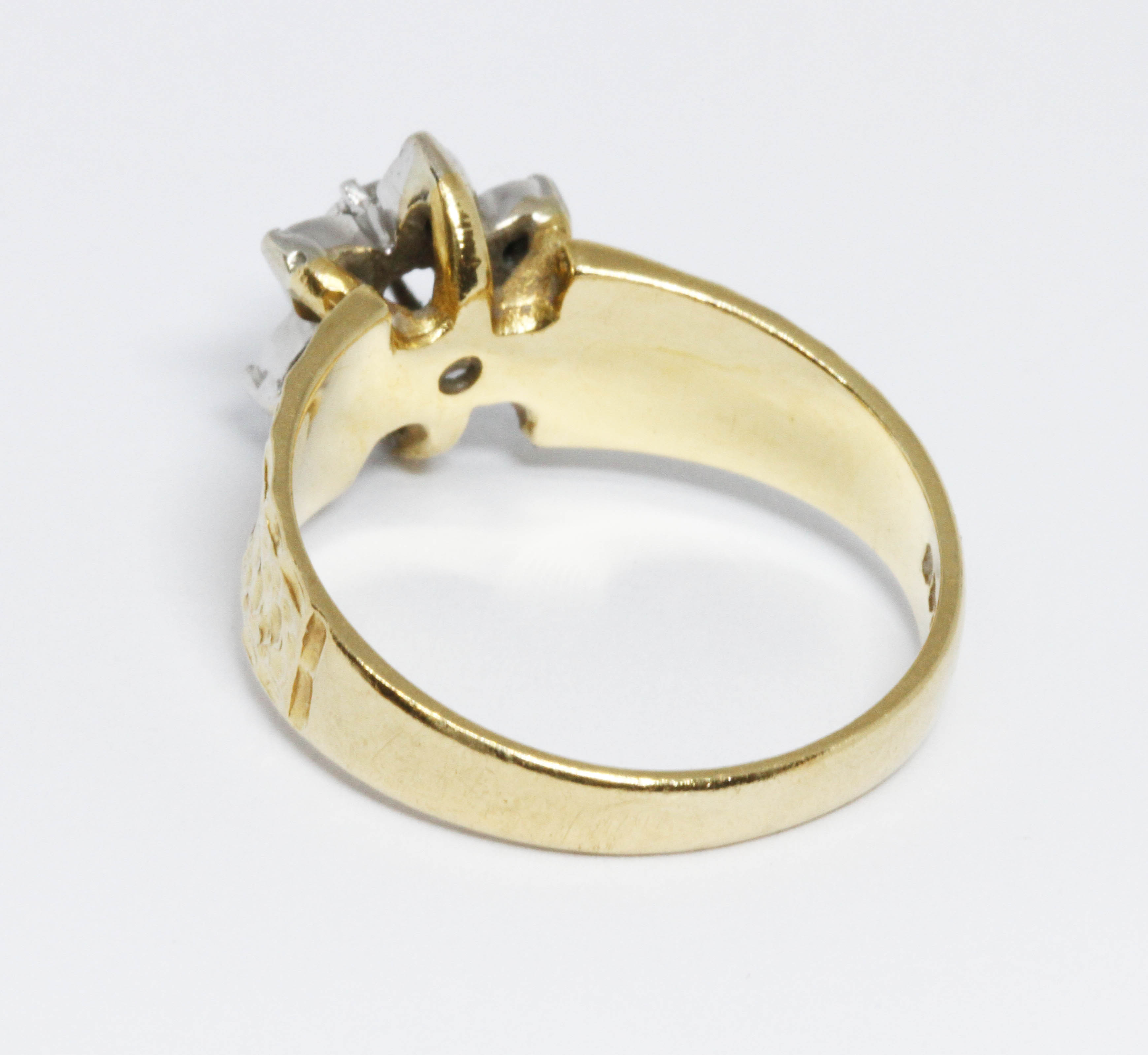 A hallmarked 18ct gold diamond cluster ring, the flower head cluster measuring approximately 10mm in - Image 2 of 4