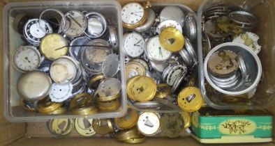 A box of assorted pocket watch spares.