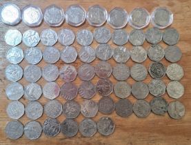 A group of 64 assorted collectable 50p coins.