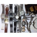 A mixed lot of gent's and ladies wristwatches including Raymond Weil, Seiko, Buler, Casio etc.