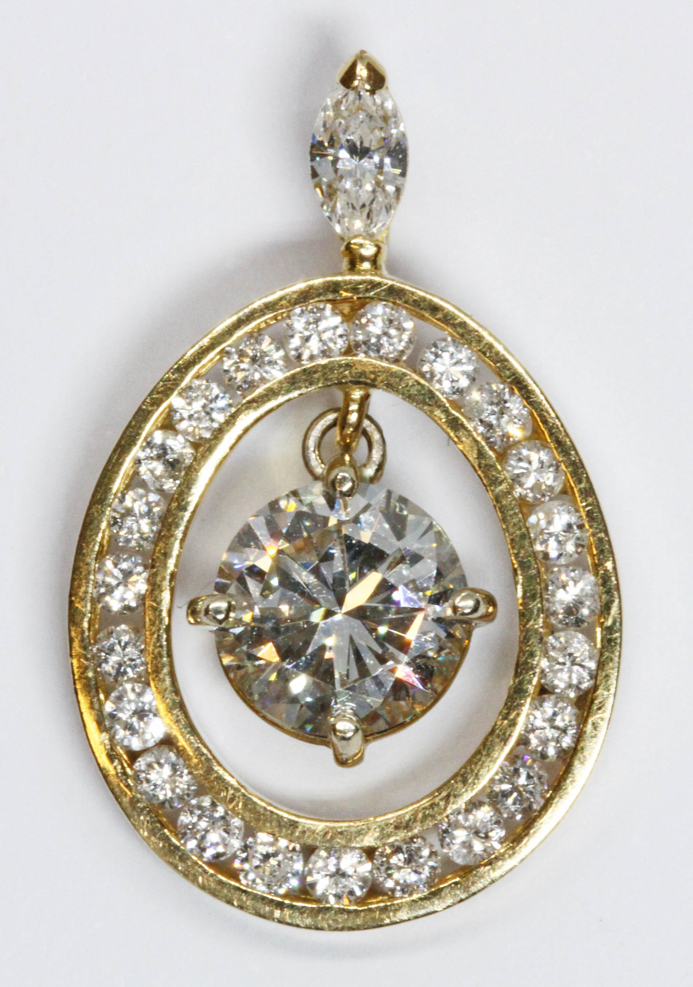 A diamond pendant, the central round brilliant cut stone weighing approximately 1.51 carats, - Image 2 of 2