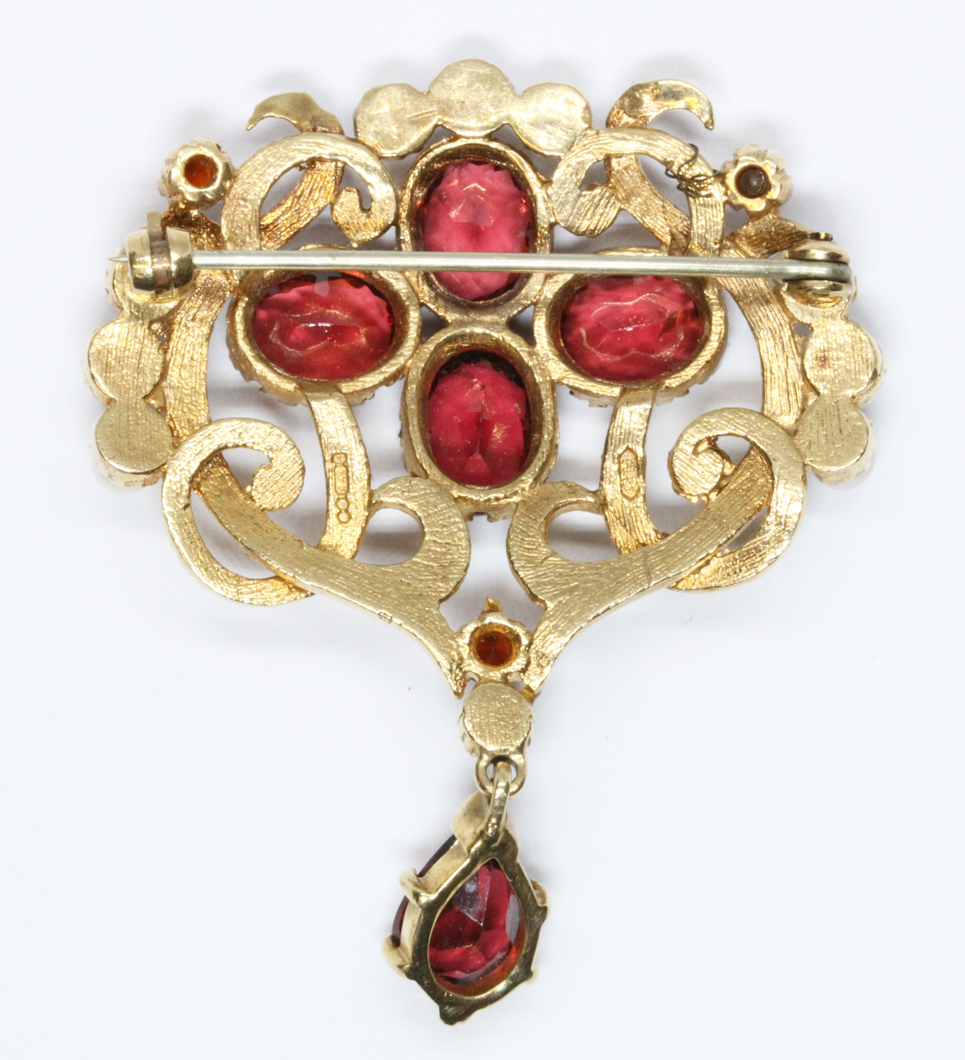 A 9ct gold garnet and cultured pearl brooch, sponsor 'H.B', London 1972, length 50mm, gross weight - Image 2 of 2