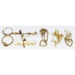 A mixed lot comprising two rings, a chain, two brooches and two pendants, various 9ct marks, gross