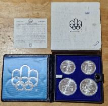 A silver proof four coin set, Canada 1976 Olympics, with certificate in case.