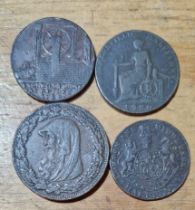 A group of four copper 1/2 penny tokens comprising an 1792 iron bridge coalbrook dale, 1787 anglesey