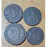 A group of four copper 1/2 penny tokens comprising an 1792 iron bridge coalbrook dale, 1787 anglesey