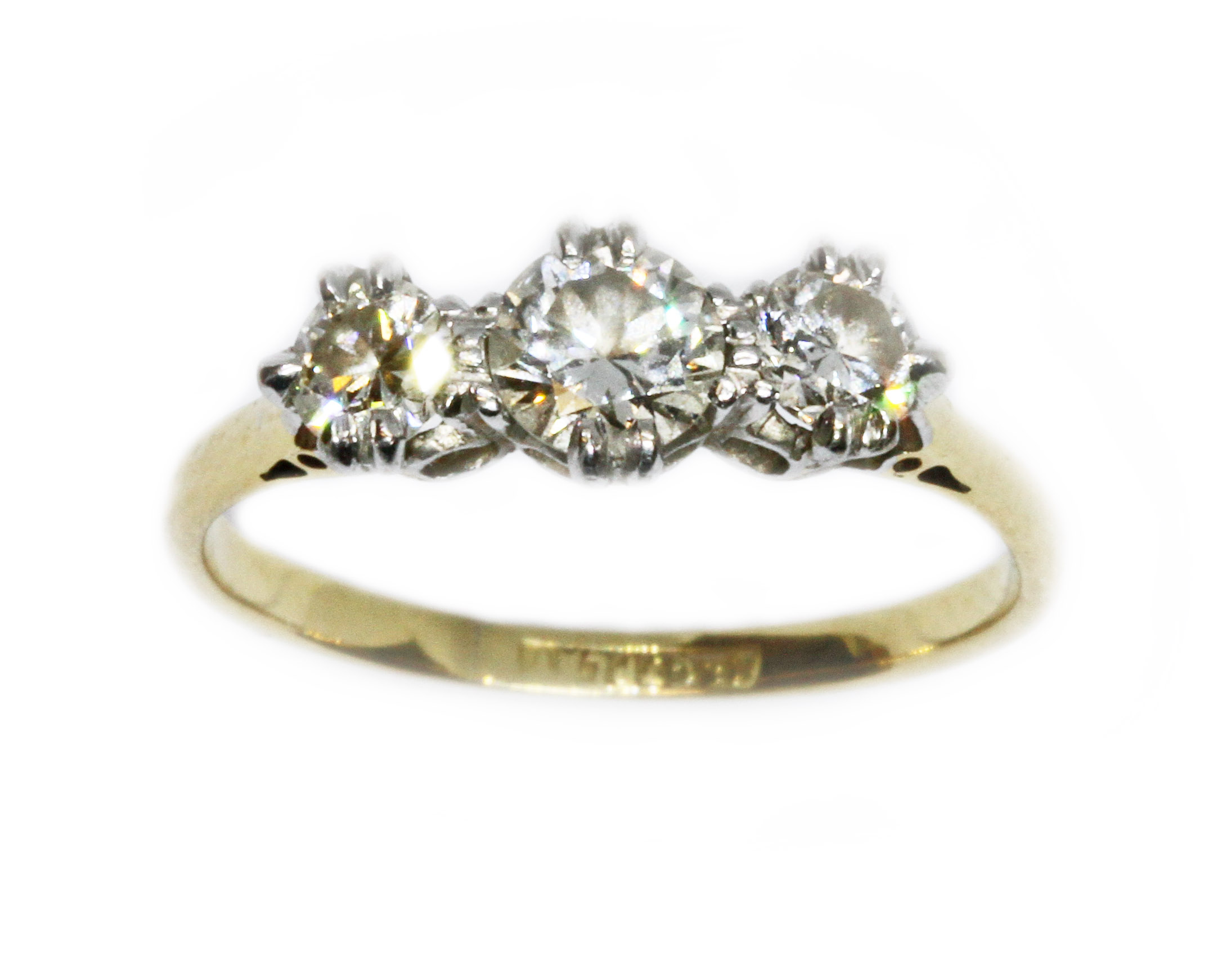 A mid 20th century three stone diamond ring, the principal stone weighing approximately 0.37 carats,