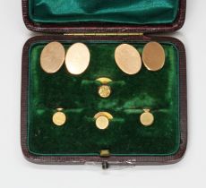 A hallmarked 9ct gold cufflink and button set, gross weight 6.7g.