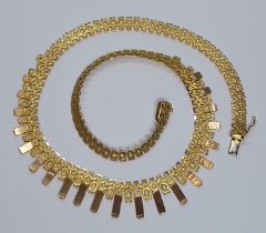 A textured fringe necklace, marked '750', length 43cm, weight 41.6g. Condition - good, general