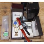 A box of assorted watches including Ingersoll, Vostok, Pulsar etc.
