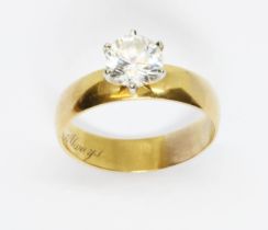 A hallmarked 22ct gold wedding band, mounted with a colourless stone, gross weight 7.6g, size W.