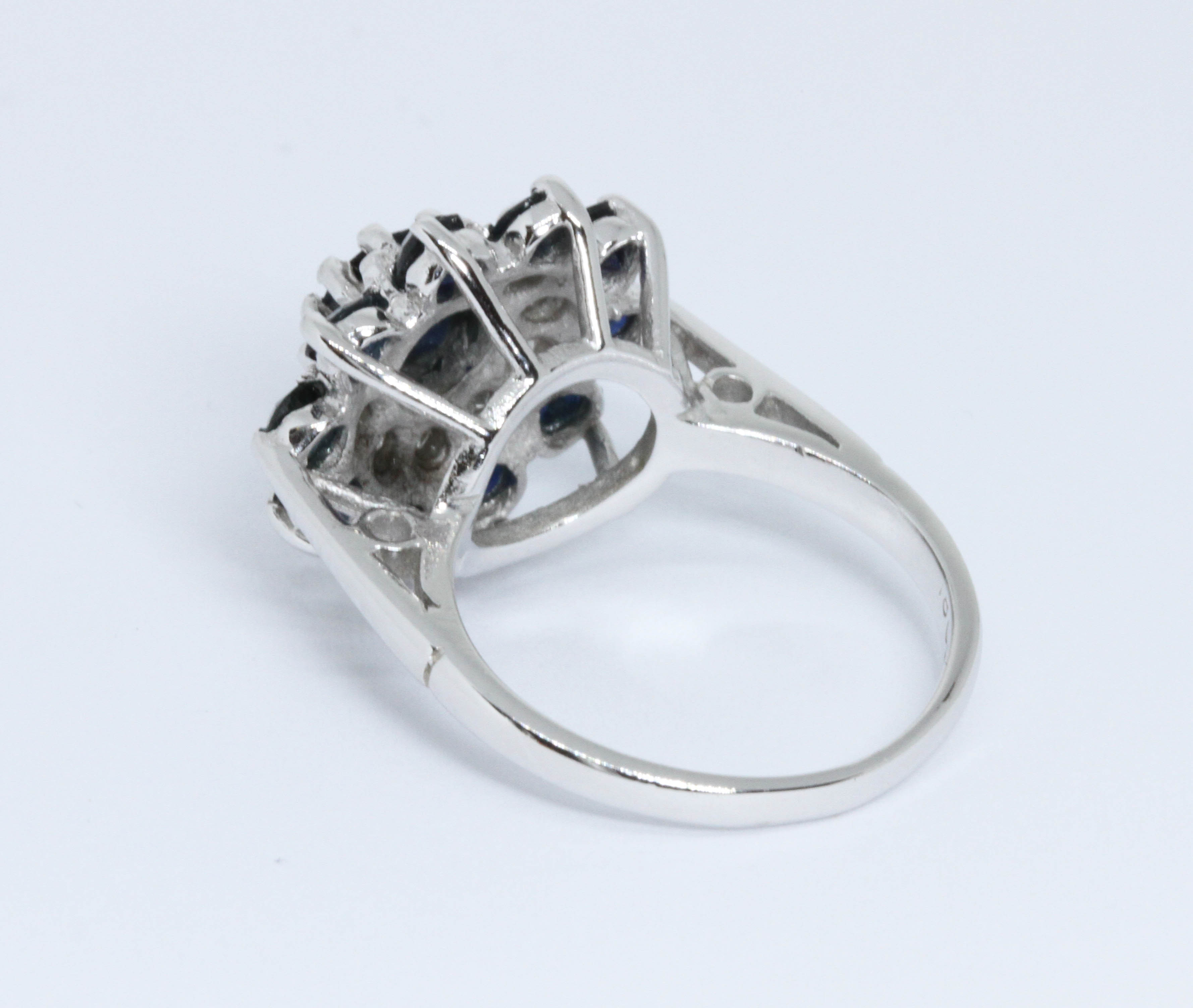 A diamond and sapphire cluster ring, the cluster measuring approximately 16mm in diameter, white - Image 2 of 5