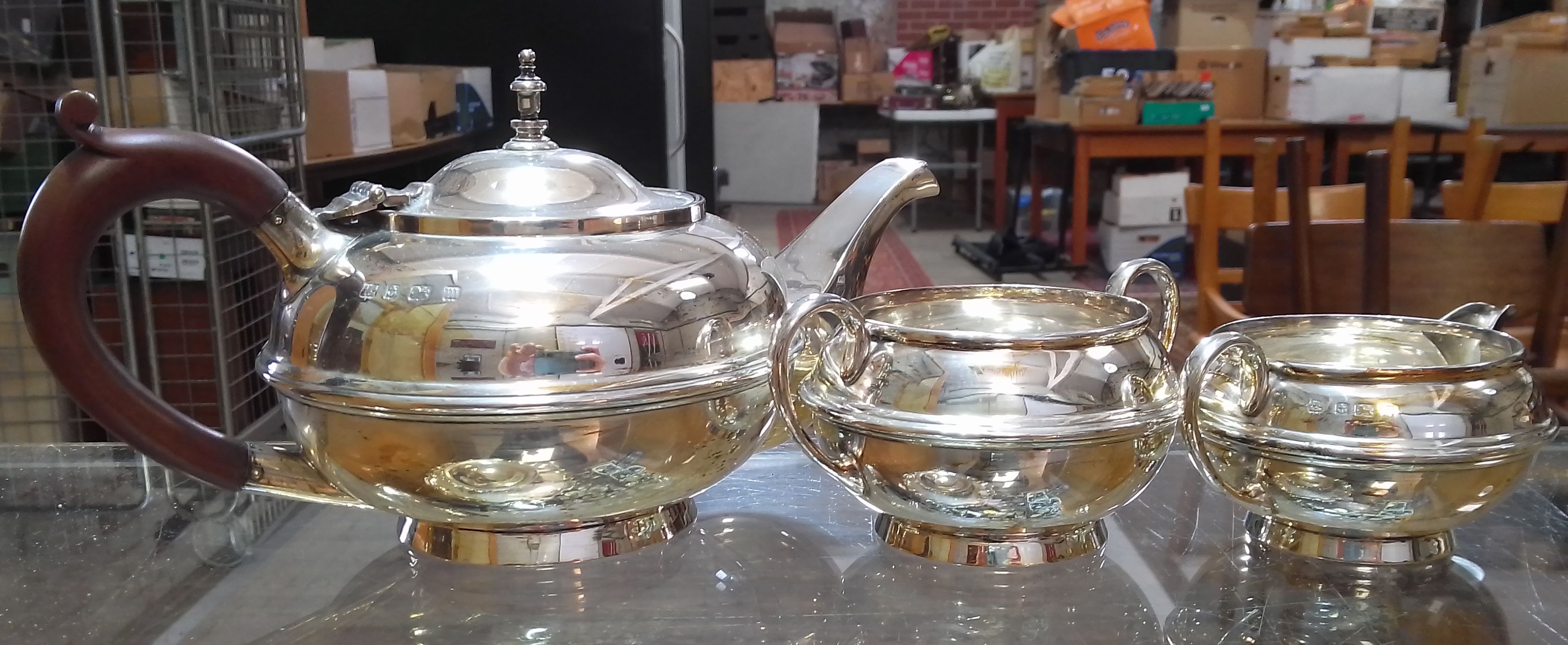 A George V three piece silver tea set, S W Smith & Co, Birmingham 1911, gross weight 26.5ozt.