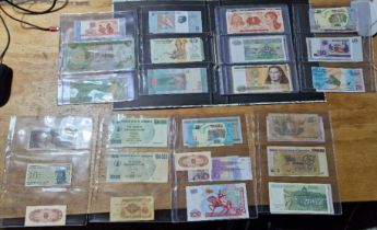 A file of assorted world banknotes