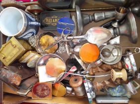 A box of assorted items including a Martini cocktail spoon, vintage compacts, metal ware, carriage