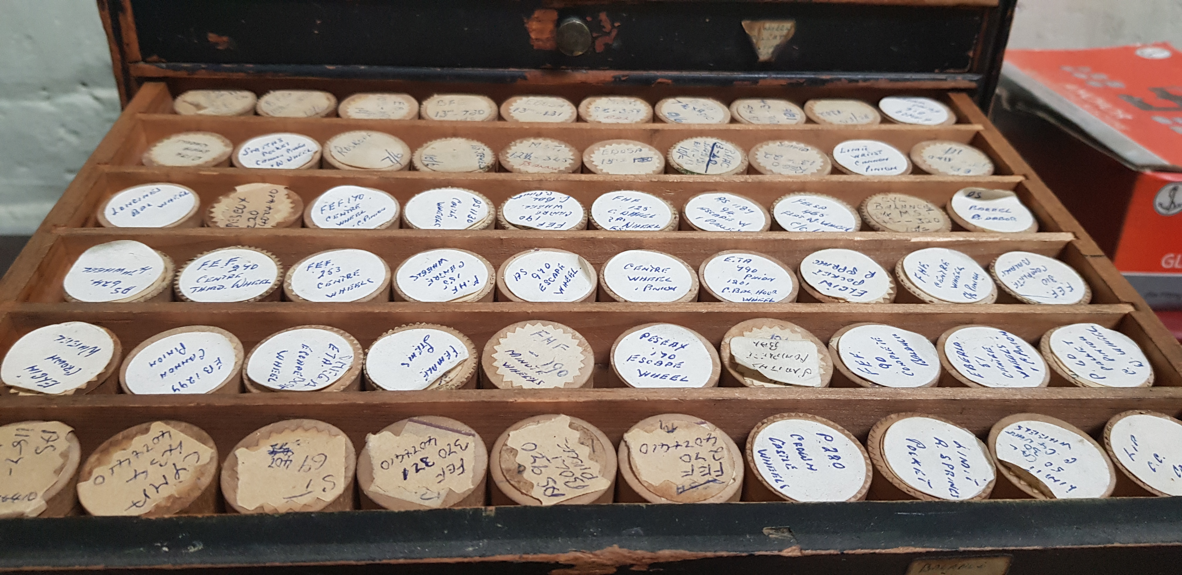 A cabinet of assorted watch spares. - Image 5 of 7