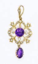 An early 20th century amethyst and seed pearl pendant, marked '15ct', length 43mm, gross weight 3.