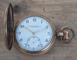 A gold plated full hunter pocket watch and a ladies silver cased pocket watch with keys and original