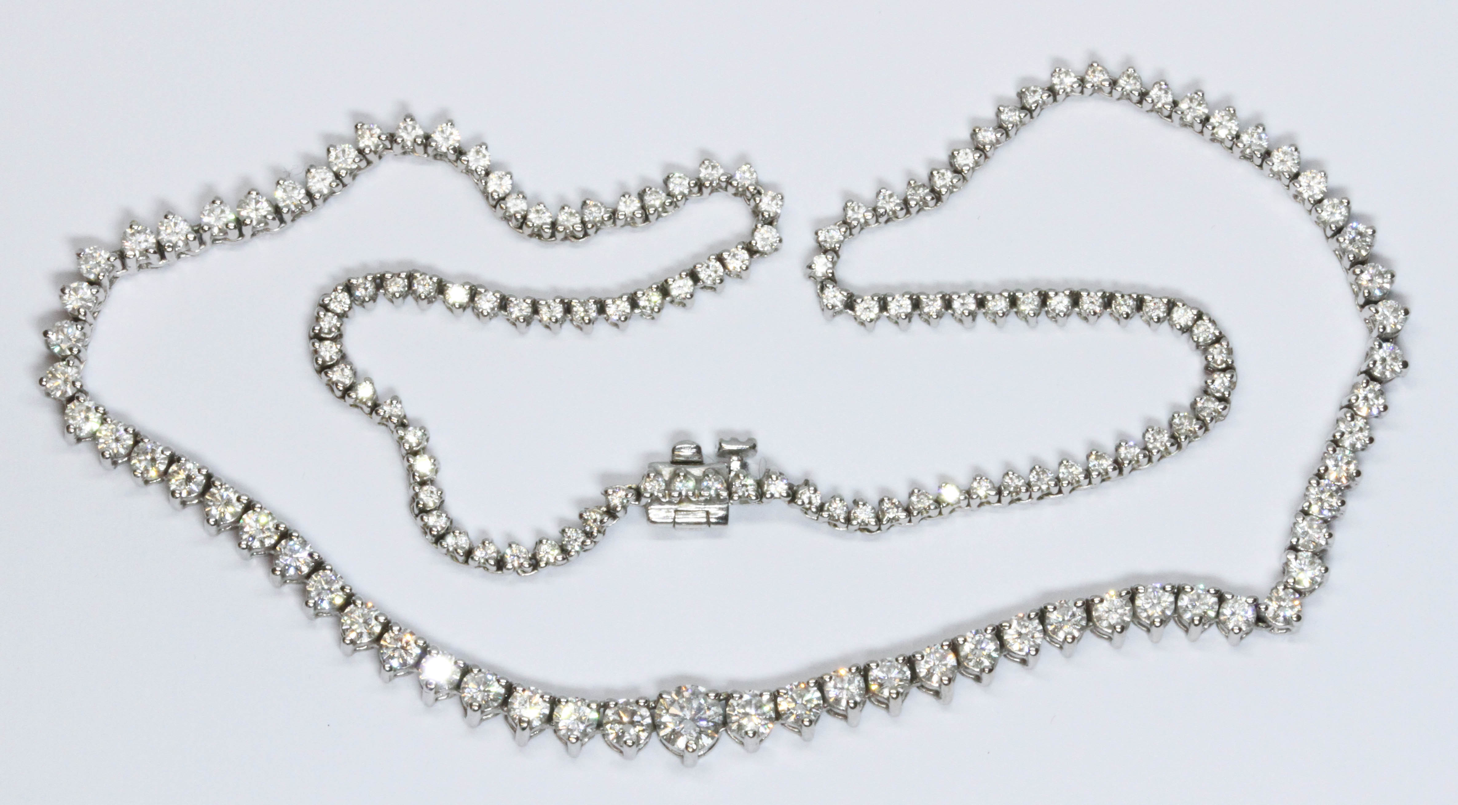 A diamond rivière necklace, the graduated round brilliant cut stones weighing approximately 8 carats