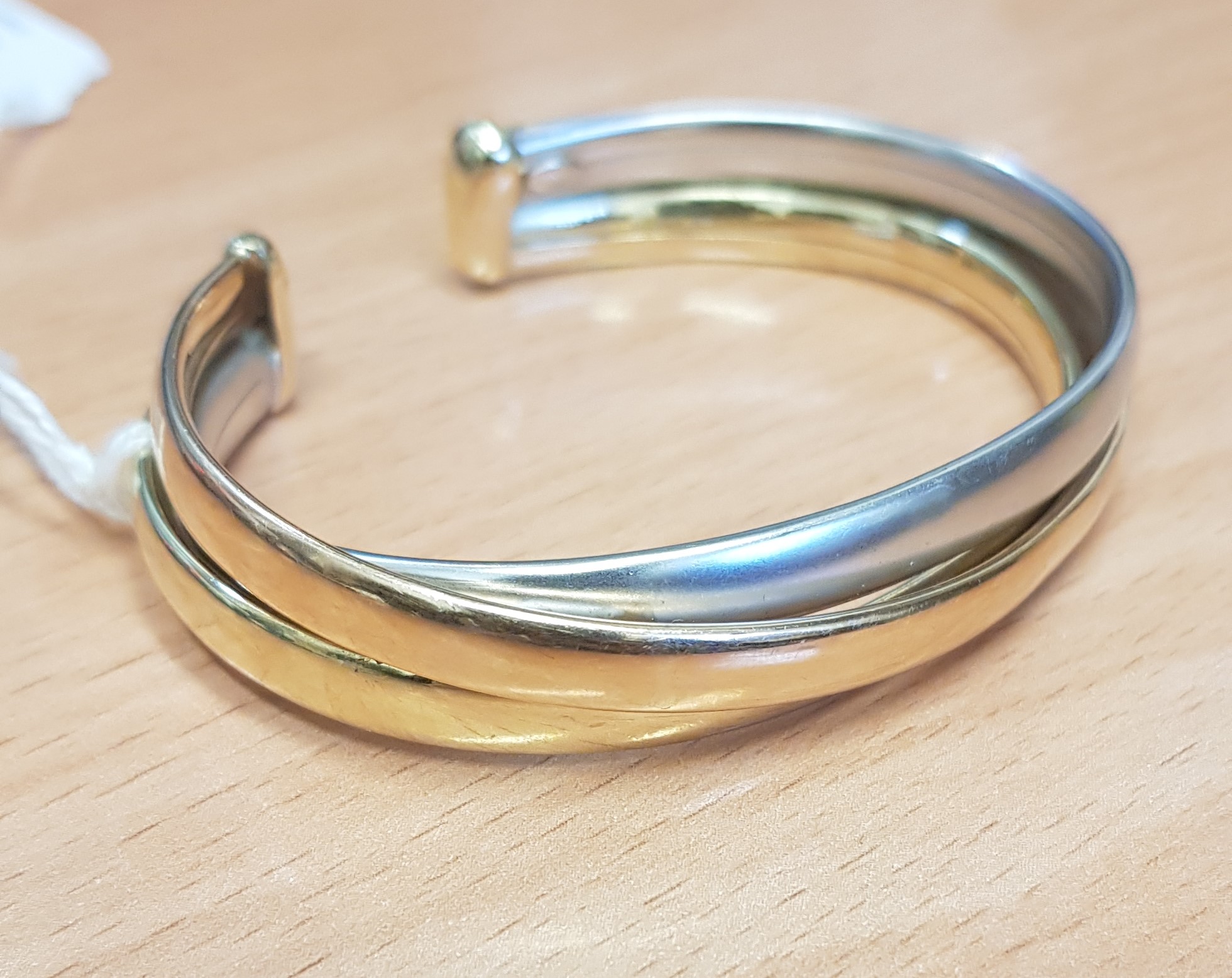 A three colour bangle, marked 'CETAS 585', diameter 6cm, weight 23.2g. Condition - good, minor - Image 3 of 3