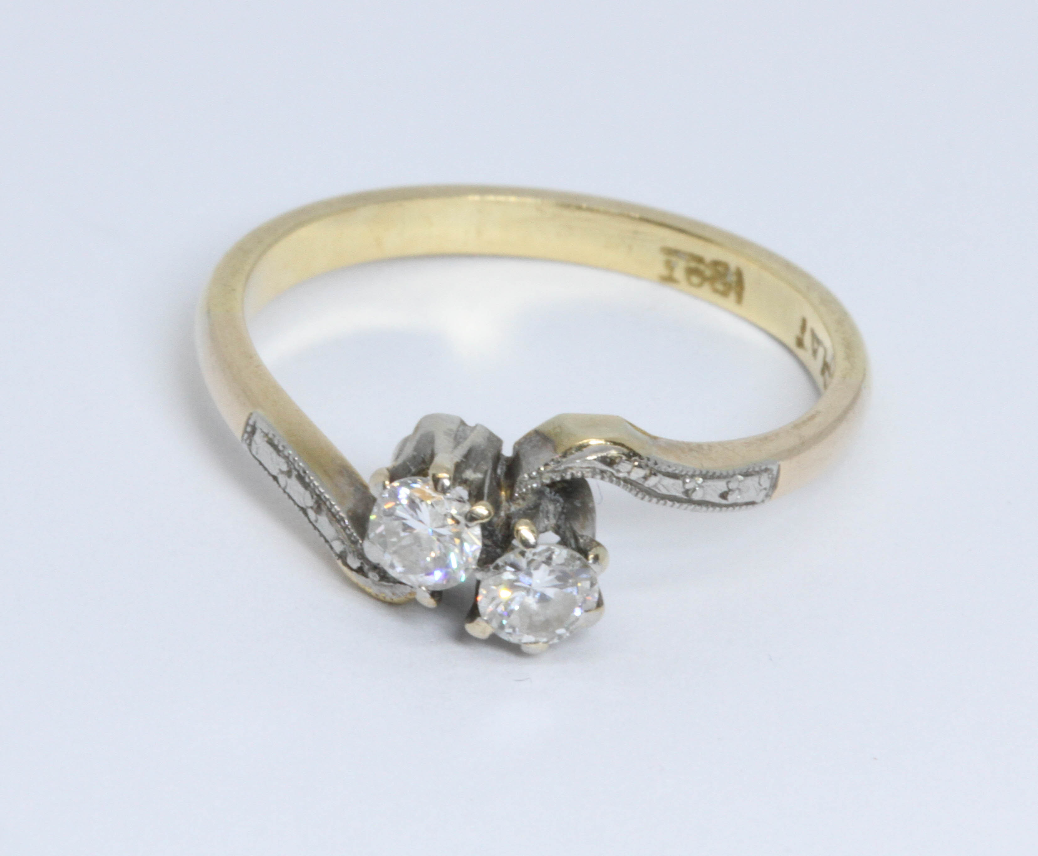 A mid 20th century two stone diamond cross over ring, total diamond weight approximately 0.22 - Image 3 of 3