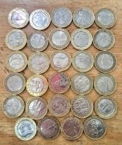 A group of 29 assorted collectable £2 coins.