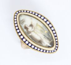 A Georgian navette ring, circa 1800, miniature portrait on ivory painted en grille, blue and white