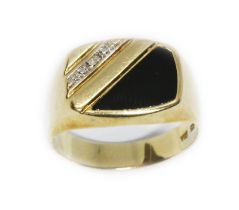 A 9ct gold diamond and black onyx ring, international convention marks, gross weight 3.4g, size R.