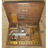 A boxed Triumph watch lathe accessory.